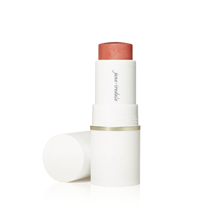 Na obrázku vidíme multifunkční krémovou tyčinku Glow Time® Blush Stick značky Jane Iredale s sejmutým víčkem, díky čemuž je vidět růžový odstín produktu.