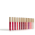 Na obrázku je vidět celá řada lesků Jane Iredale HydroPure Hyaluronic Lip Gloss. Každý má jedinečnou barvu a finiš – od transparentních, přes jemné růžové a broskvové odstíny až po výrazné červené a burgundské.
