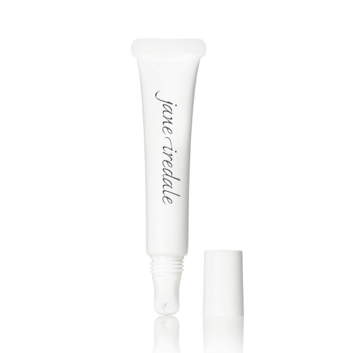 Na obrázku je průhledná tubička produktu značky Jane Iredale s bílým uzávěrem a aplikátorem typu „roll-on“ nebo se zkoseným aplikátorem. Balení je minimalistické, s elegantním logem značky vytištěným na přední straně.