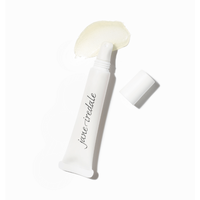 Na obrázku je vidět otevřená tubička kosmetického produktu značky Jane Iredale, ze které bylo vytlačeno malé množství průhledného gelového balzámu s lehce nažloutlým odstínem. Obal má minimalistický design.