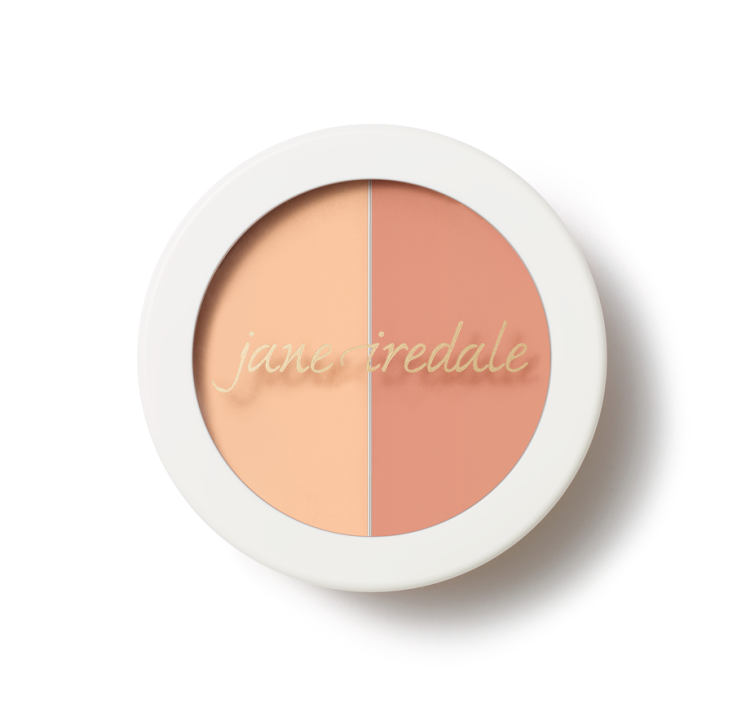 Krémový korektor Circle Delete Concealer Peach v kulatém obalu s bílým víčkem. Obsahuje dva odstíny – broskvový a béžový, které lze míchat, ideální pro přizpůsobení barvy a zakrytí kruhů pod očima. Světlejší varianta pro světlou pleť.