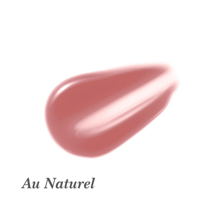 Na obrázku je lesk na rty Jane Iredale v odstínu Au Naturel. Au Naturel je jemný, teplý nude odstín s nádechem růžové. Vytváří přirozený, subtilní efekt s leskem – ideální pro každodenní líčení.