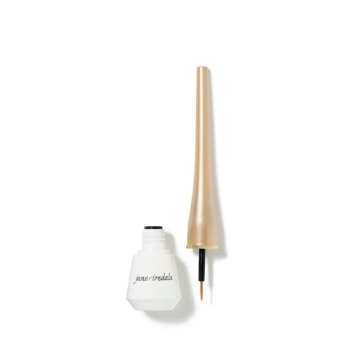 Tekuté oční linky Jane Iredale s tenkým, precizním štětečkem – ideální pro vytváření přesných linek. Produkt je v elegantním, štíhlém balení s bílým matným spodkem a zlatým víčkem.