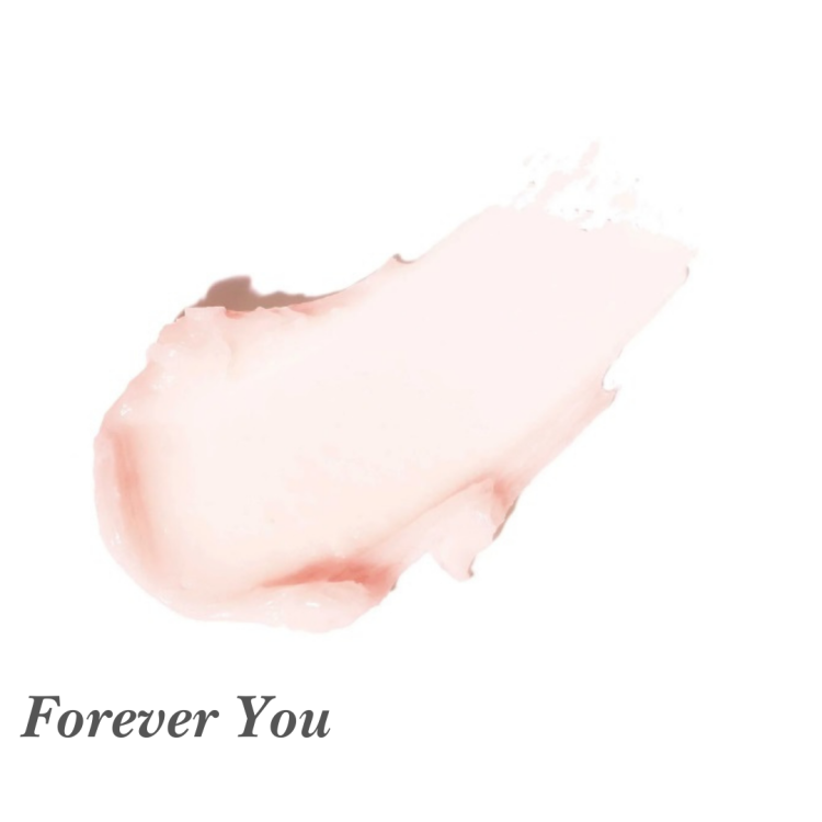 Na obrázku je vidět odstín Forever You z řady Just Kissed Lip and Cheek Stain značky Jane Iredale. Barva produktu je velmi jemná, téměř transparentní, se subtilním růžovým tónem.