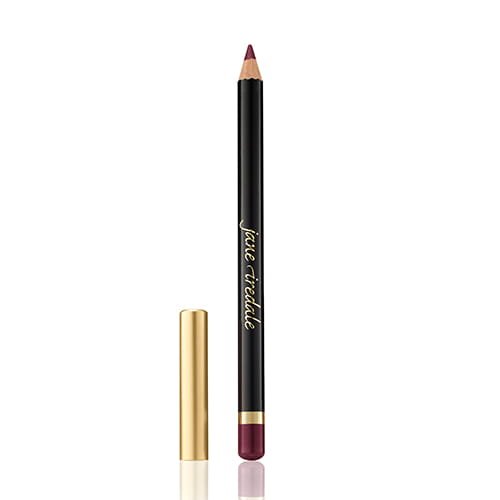 Na obrázku je viditelná konturovací tužka na rty značky Jane Iredale. Produkt má elegantní vzhled – černá tužka se zlatým nápisem a zlatým víčkem. Viditelný konec naznačuje intenzivní, hluboký odstín růžové nebo burgundské.