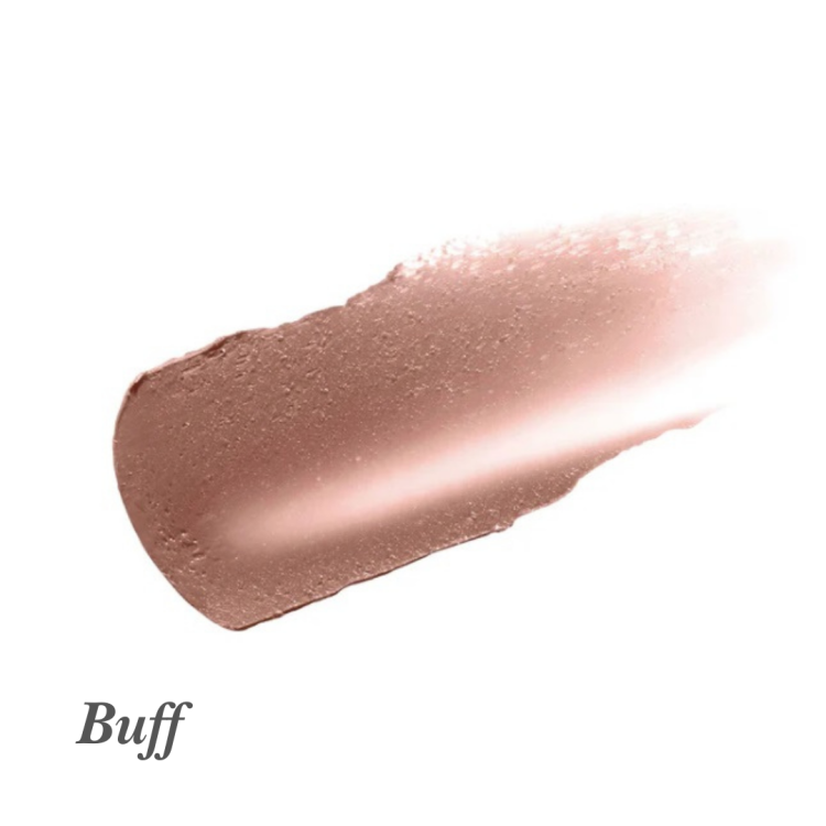 Na grafice je zobrazena barevná ukázka produktu na rty značky Jane Iredale s názvem Buff. Jde o odstín v tónu neutrální béžové s lehkým leskem. Textura působí krémově a jemně rozjasňujícím dojmem, což naznačuje komfortní finiš.