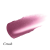 Na grafice je vidět barevná ukázka rtěnky nebo balzámu na rty značky Jane Iredale v odstínu Crush. Jde o chladnou, sytě růžovou barvu přecházející do švestkového tónu s jemným leskem. Textura působí krémově a hladce.