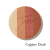 Kulatý, lisovaný multifunkční bronzer na obličej značky Jane Iredale v odstínu Copper Dusk s vyraženým logem Jane Iredale. Bronzer se skládá ze čtyř odstínů.
